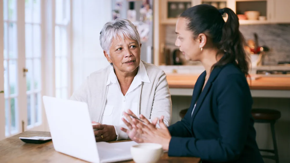 A solicitor talking a client through their options